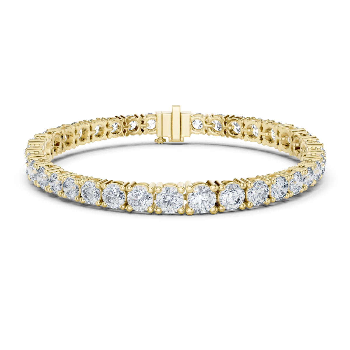 Gold bracelet with clear moissanite gemstones on a white background