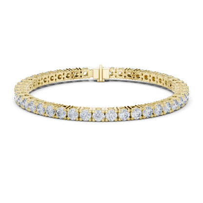 A yellow gold tennis bracelet adorned with round brilliant-cut moissanite diamonds, shown on a clean white background.