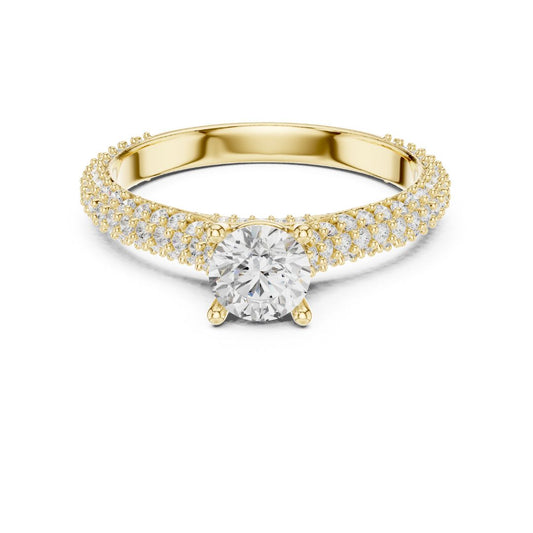 Gold ring with a moissanite diamond on a white background