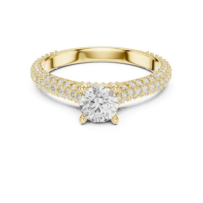 Gold ring with a moissanite diamond on a white background