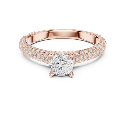 Rose gold ring with a moissanite diamond on a white background