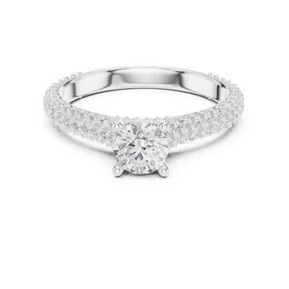 Silver ring with a moissanite diamond on a white background