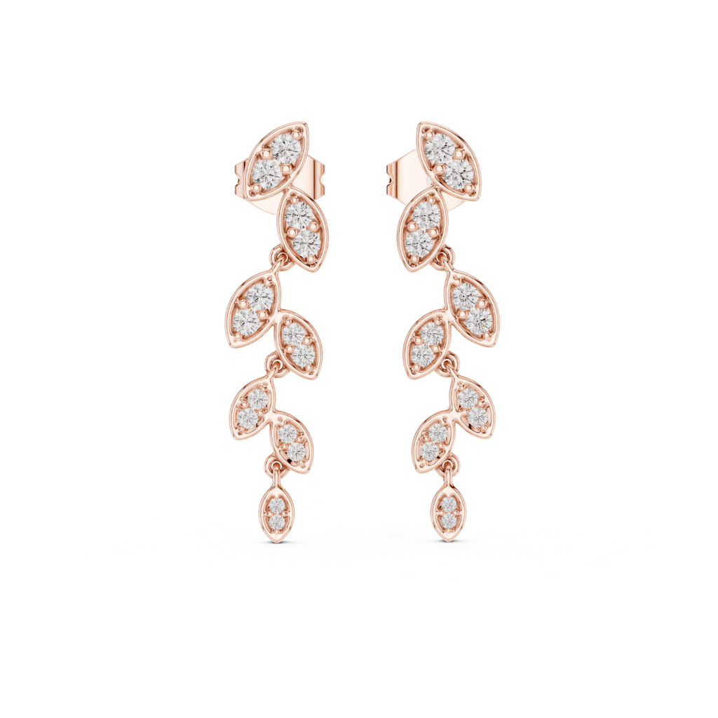 Rose gold earrings with moissanite diamond accents on a white background