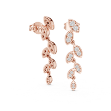 Load image into Gallery viewer, Rose gold earrings with moissanite diamond accents on a white background
