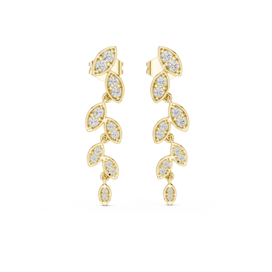 Gold earrings with moissanite diamond-like stones on a white background