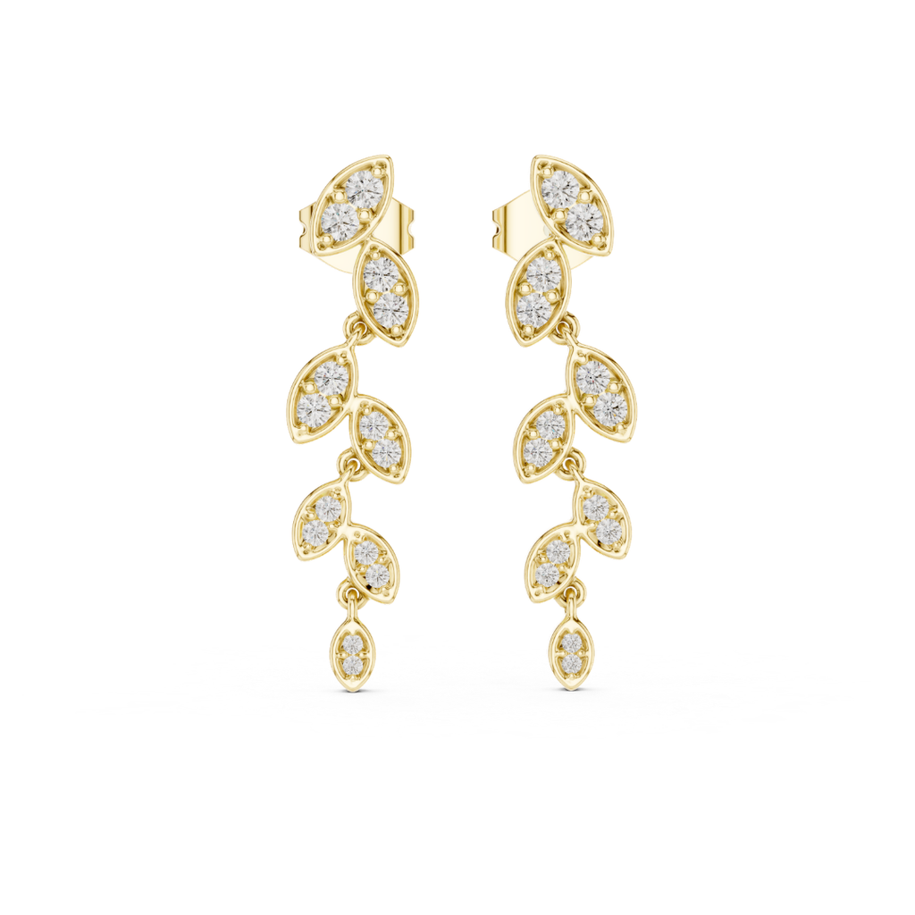 Gold earrings with moissanite diamond-like stones on a white background