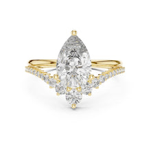 Load image into Gallery viewer, Gold ring with a pear-shaped moissanite diamond on a white background