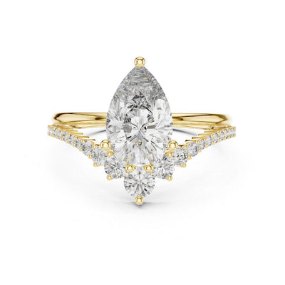 Gold ring with a pear-shaped moissanite diamond on a white background