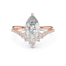 Load image into Gallery viewer, Rose gold ring with a pear-shaped moissanite diamond on a white background
