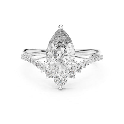 moissanite Diamond ring with a pear-shaped center stone on a white background