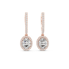 Load image into Gallery viewer, Rose gold earrings with clear moissanite gemstones on a white background