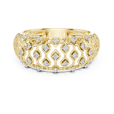 Gold ring with moissanite diamond accents on a white background