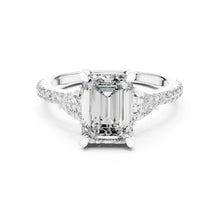 Load image into Gallery viewer, moissanite Diamond ring with a central emerald-cut diamond and smaller diamonds on a white background