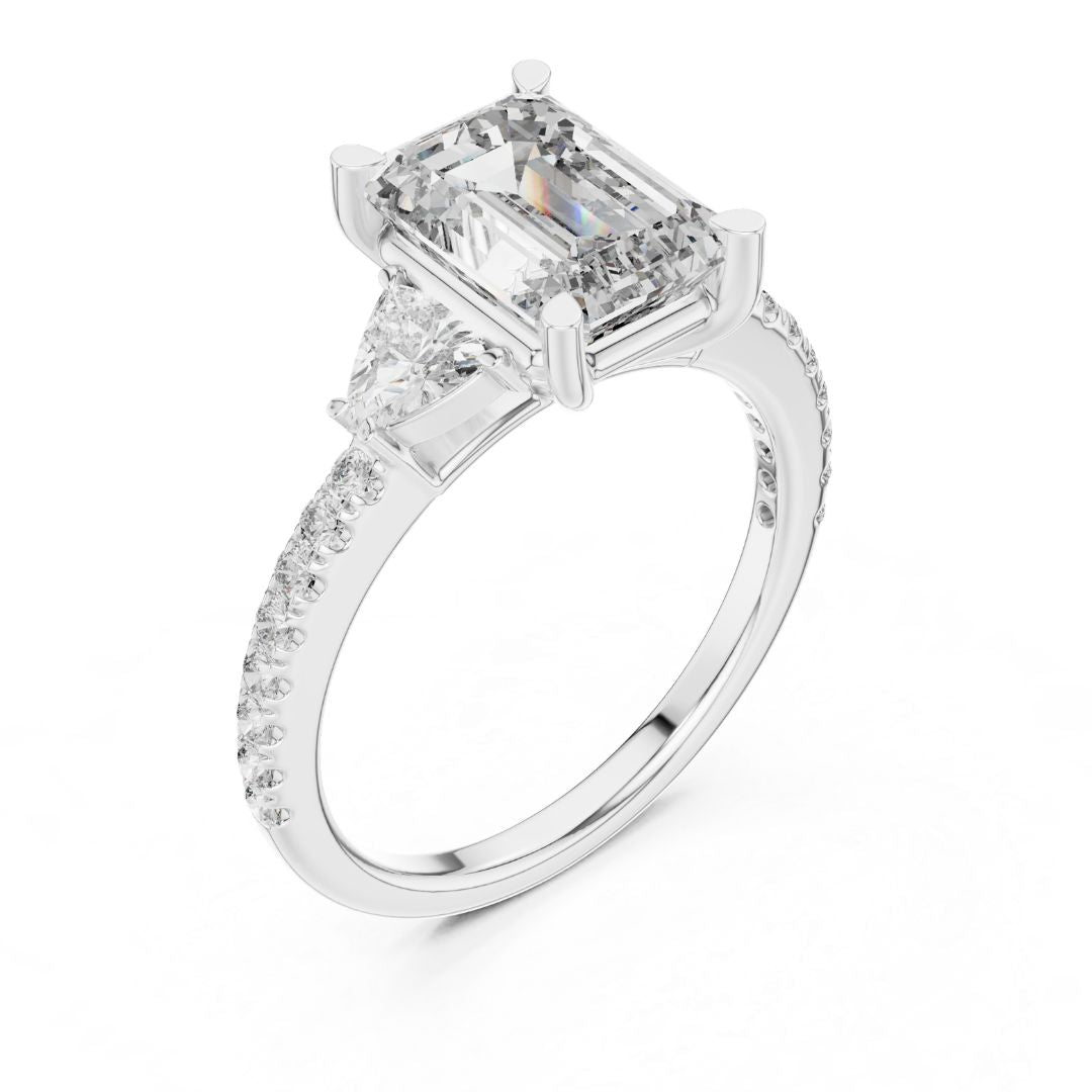 moissanite Diamond ring with a central emerald-cut diamond and smaller diamonds on a white background