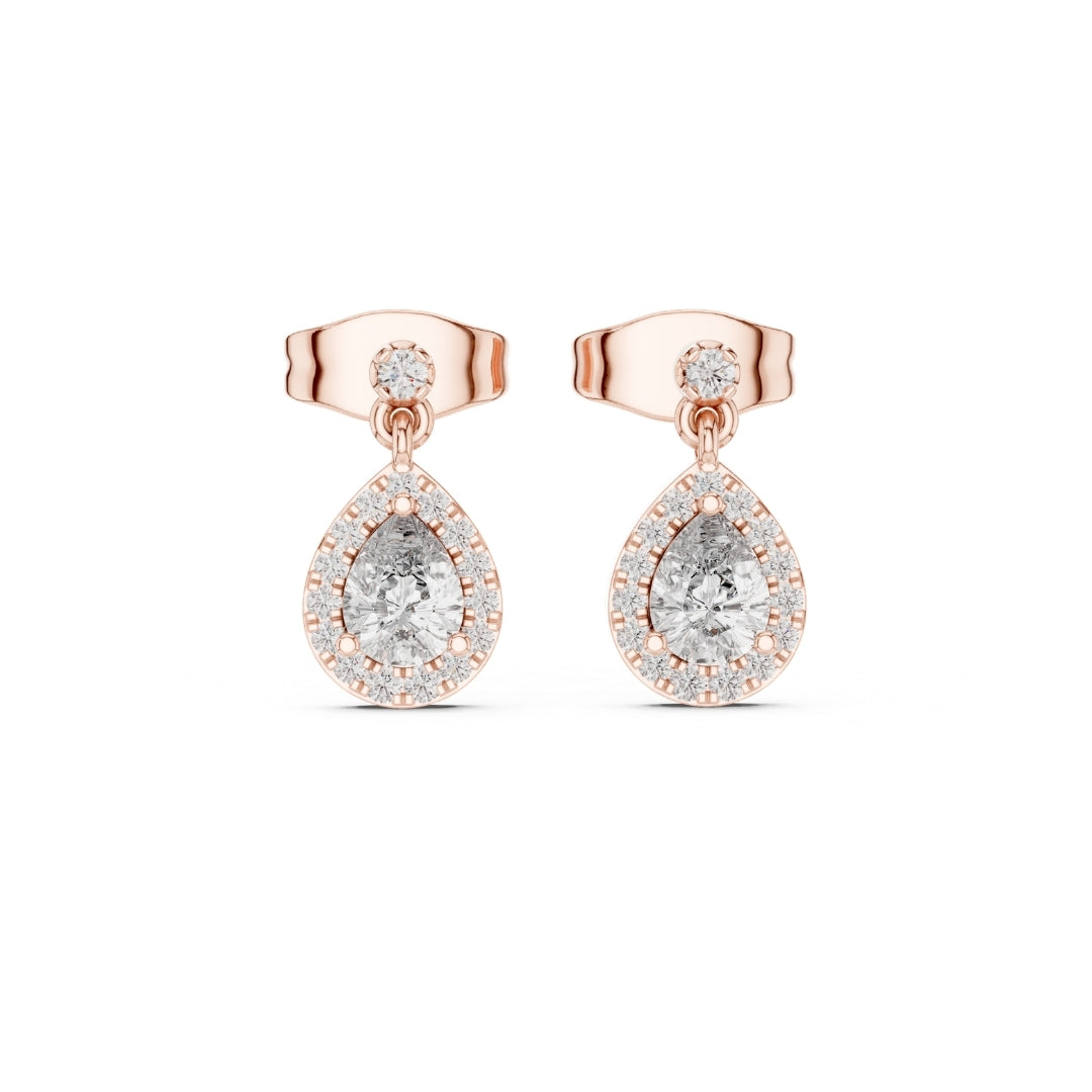 Rose gold earrings with clear moissanite gemstones on a white background