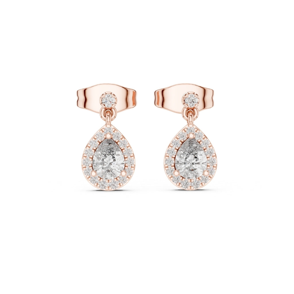 Rose gold earrings with clear moissanite gemstones on a white background