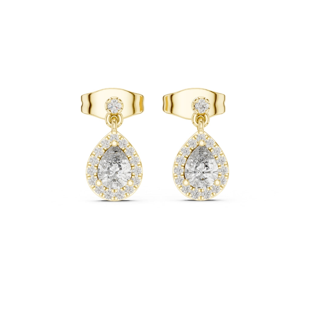 Gold earrings with clear moissanite gemstones on a white background