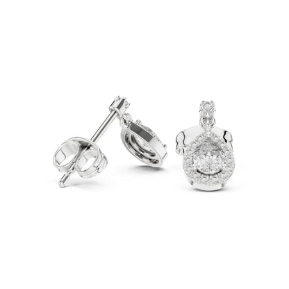 Silver moissanite diamond earring set on a white background