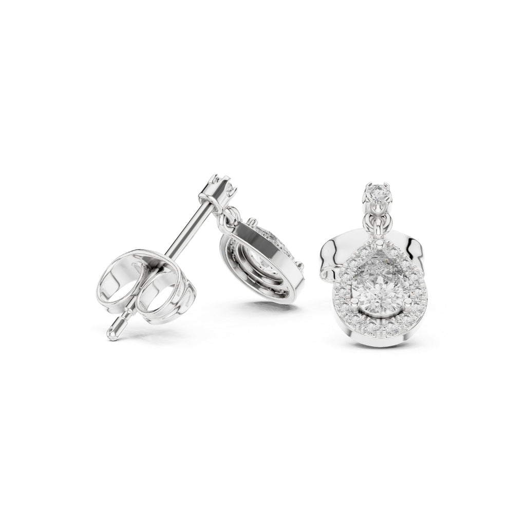 Silver moissanite diamond earring set on a white background