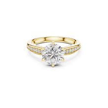 Load image into Gallery viewer, Gold ring with a large Moissanite diamond and smaller Moissanite diamonds on the band against a white background