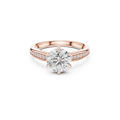 Rose gold ring with a 1ct Moissanite large diamond and Moissanite smaller diamonds on the band against a white background