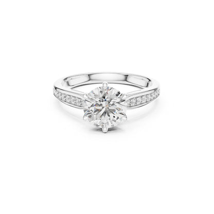 Round 1ct Moissanite Diamond ring with a white background