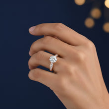 Load image into Gallery viewer, Hand wearing a 1ct Moissanite diamond ring with a dark background