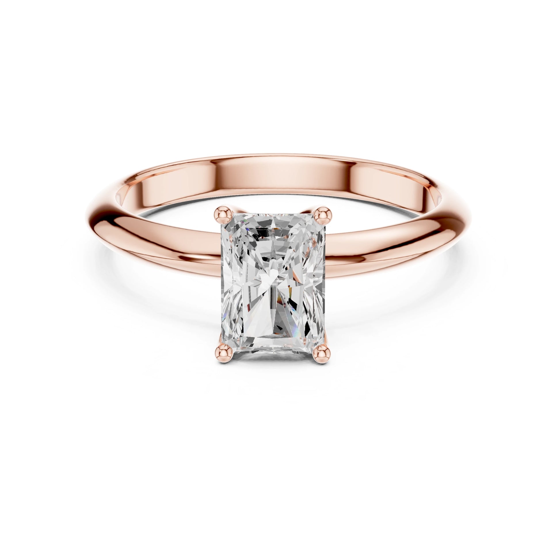 Rose gold ring with a rectangular moissanite diamond on a white background