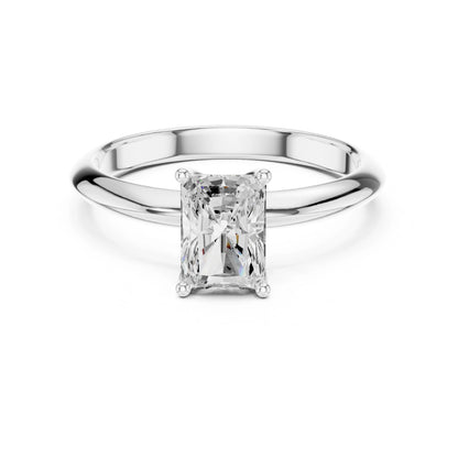 Silver ring with a rectangular moissanite diamond on a white background