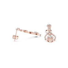 Load image into Gallery viewer, Rose gold earrings with moissanite  diamond accents on a white background