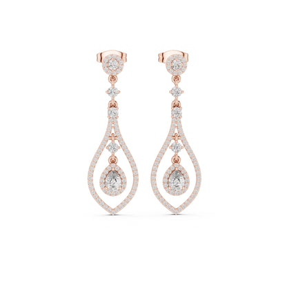 Rose gold and moissanite diamond earrings on a white background