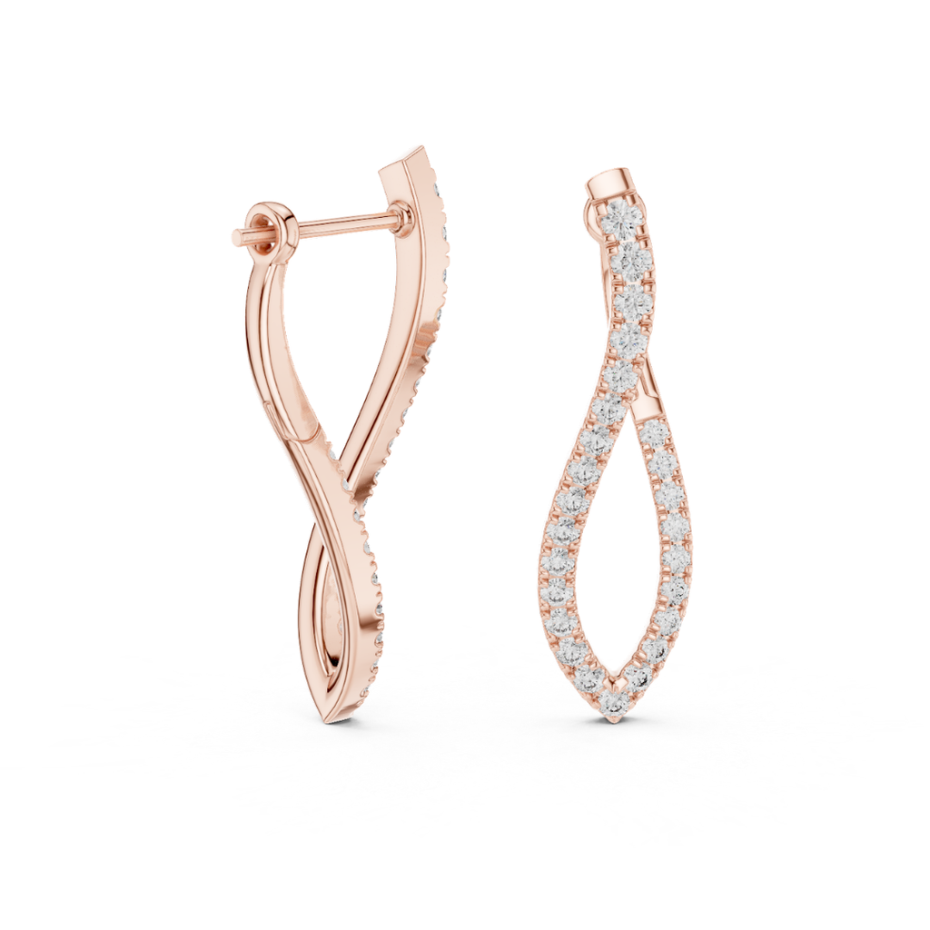 Rose gold hoop earrings with moissanite diamond accents on a white background