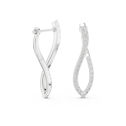 Silver hoop earrings with moissanite diamond accents on a white background