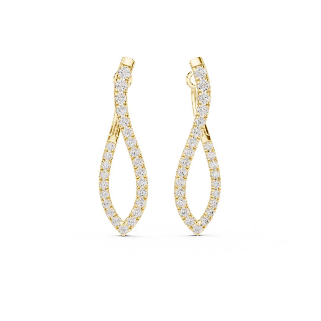 Gold finish earrings with moissanite diamond accents on a white background