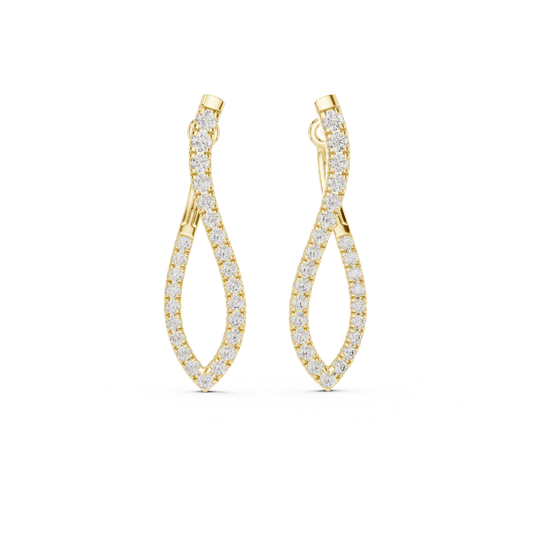 Gold finish earrings with moissanite diamond accents on a white background