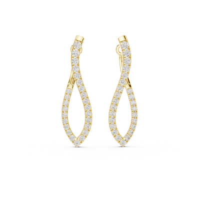 Gold finish earrings with moissanite diamond accents on a white background