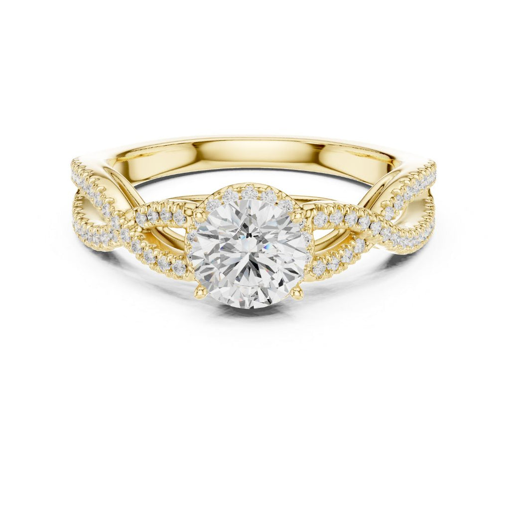Gold ring with a moissanite diamond on a white background