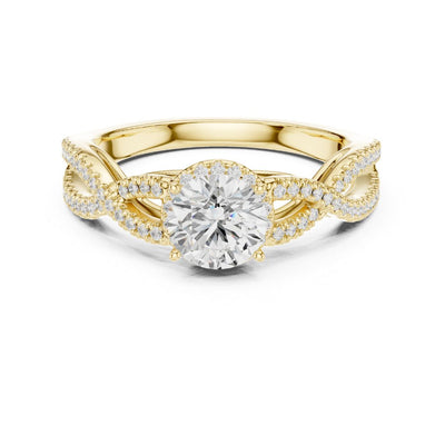 Gold ring with a moissanite diamond on a white background