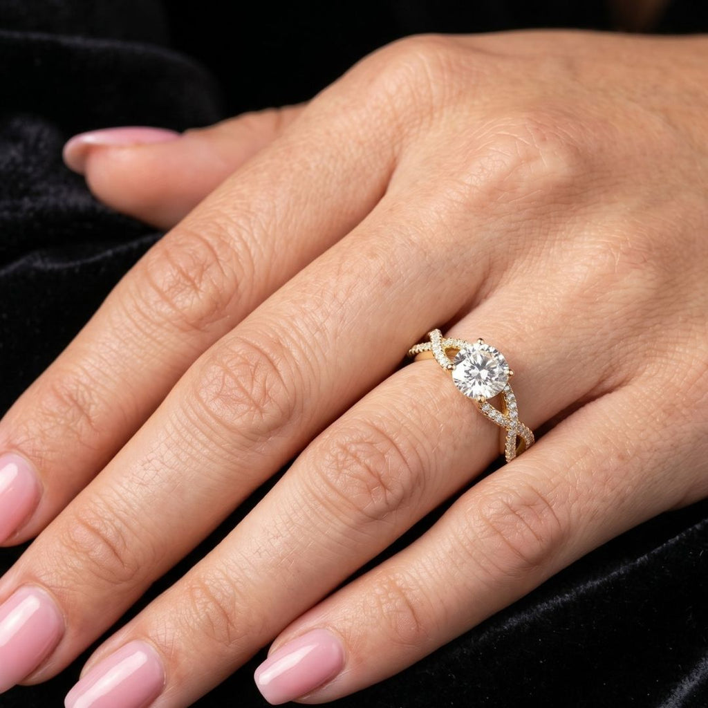 Close-up of a hand wearing a rose gold moissanite diamond ring on a black background