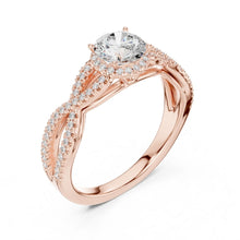 Load image into Gallery viewer, Rose gold ring with a large moissanite diamond and smaller diamonds on the band against a white background