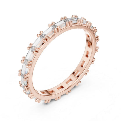 Rose gold moissanite diamond ring with clear gemstones on a white background