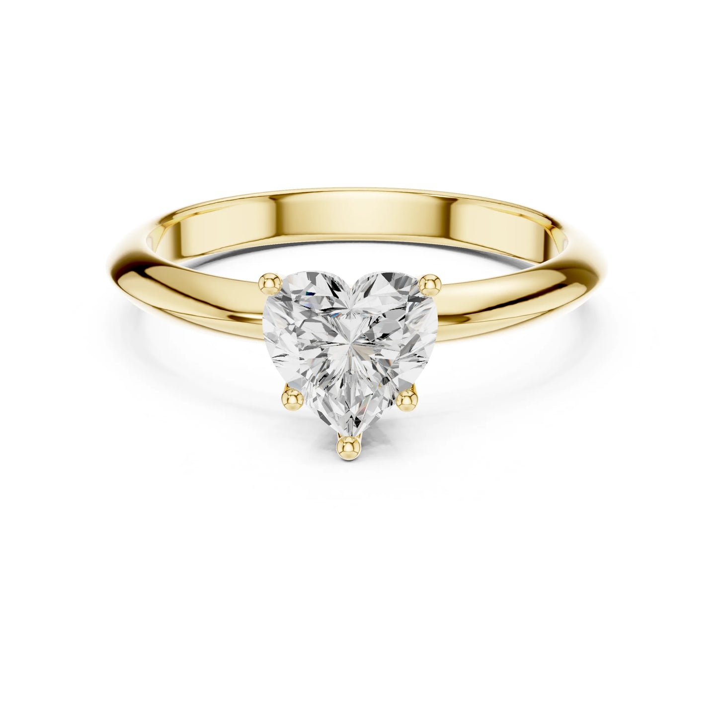 Gold ring with a heart-shaped moissanite diamond on a white background