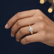 Load image into Gallery viewer, Gold ring with a Moissanite diamond on a hand against a dark background