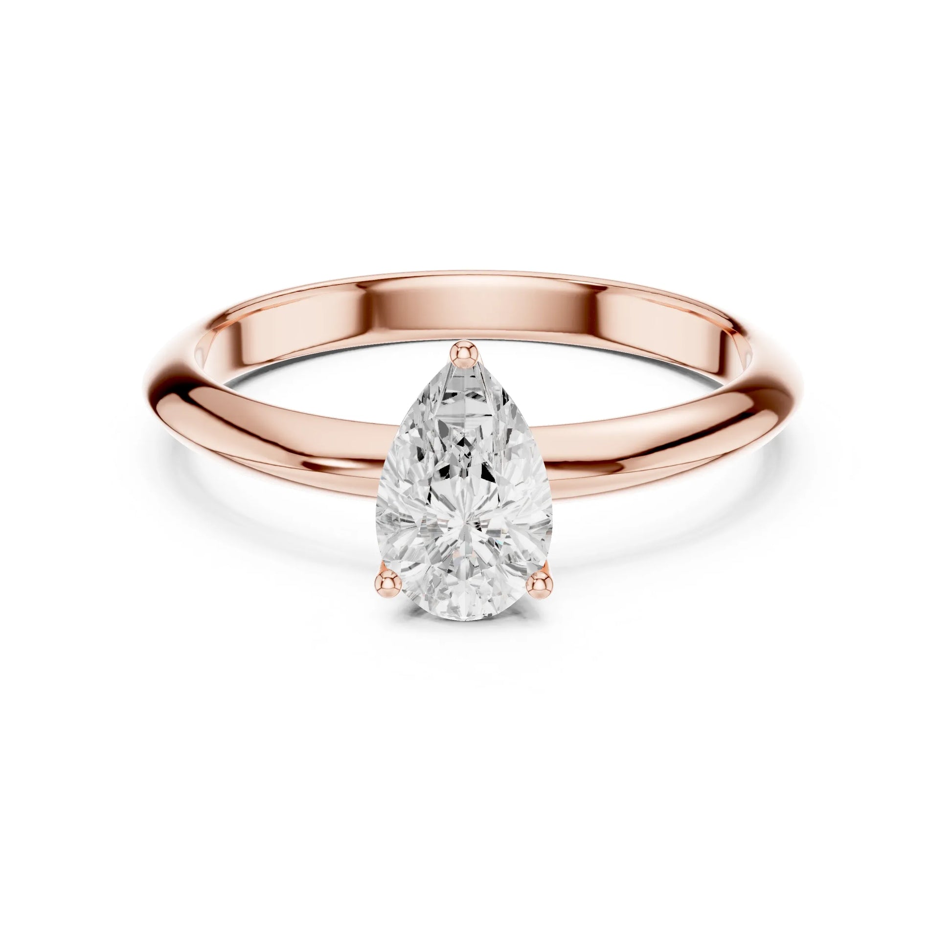 Rose gold ring with a pear-shaped moissanite diamond on a white background