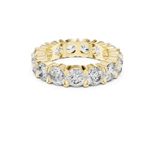 Load image into Gallery viewer, Gold ring with multiple Moissanite diamonds on a white background