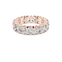 Load image into Gallery viewer, Rose gold ring with Moissanite diamonds on a white background