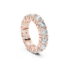 Load image into Gallery viewer, Rose gold ring with clear Moissanite gemstones on a white background