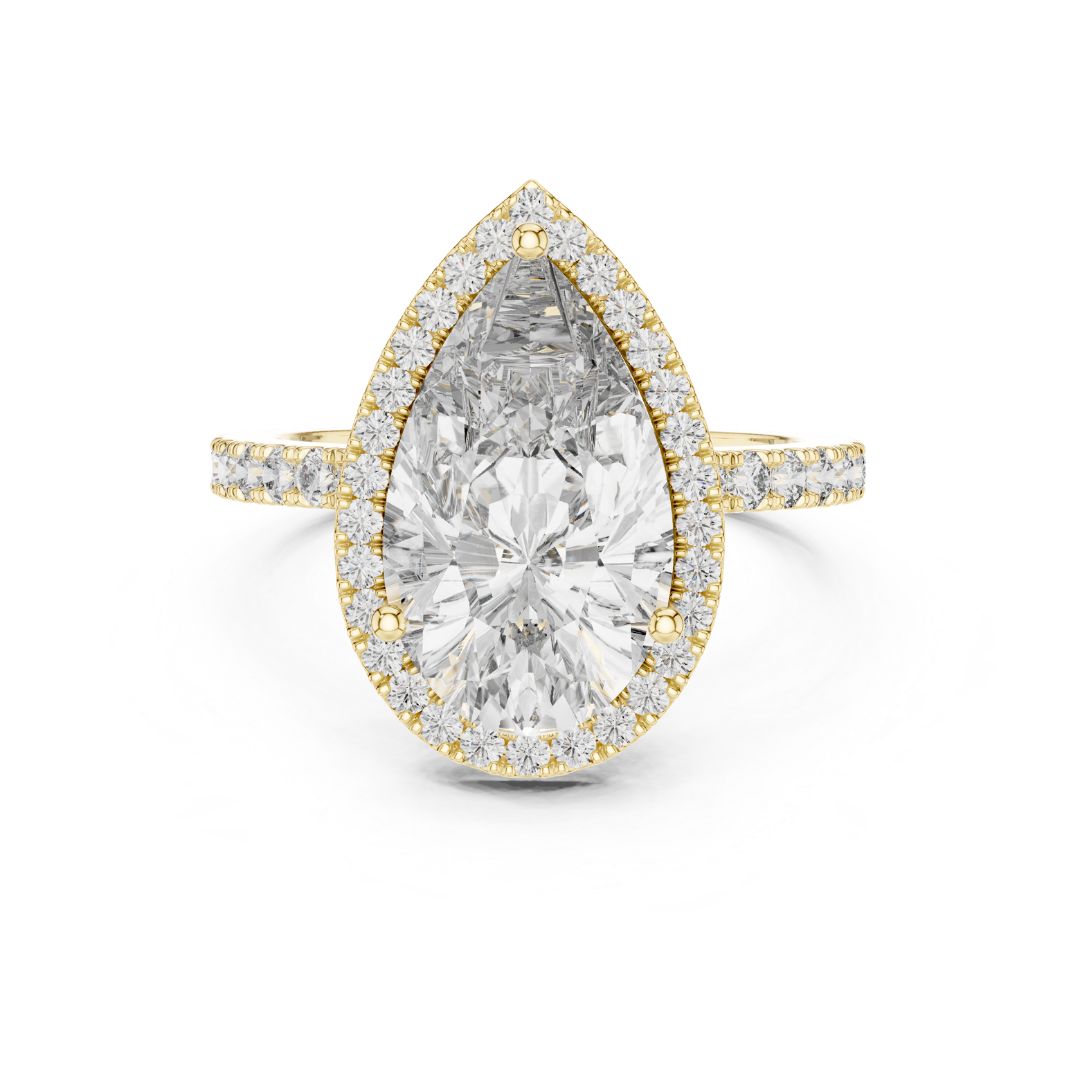 Gold ring with a large pear-shaped moissanite diamond and smaller diamonds on a white background