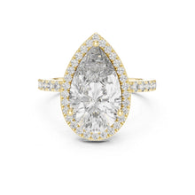 Load image into Gallery viewer, Gold ring with a large pear-shaped moissanite diamond and smaller diamonds on a white background