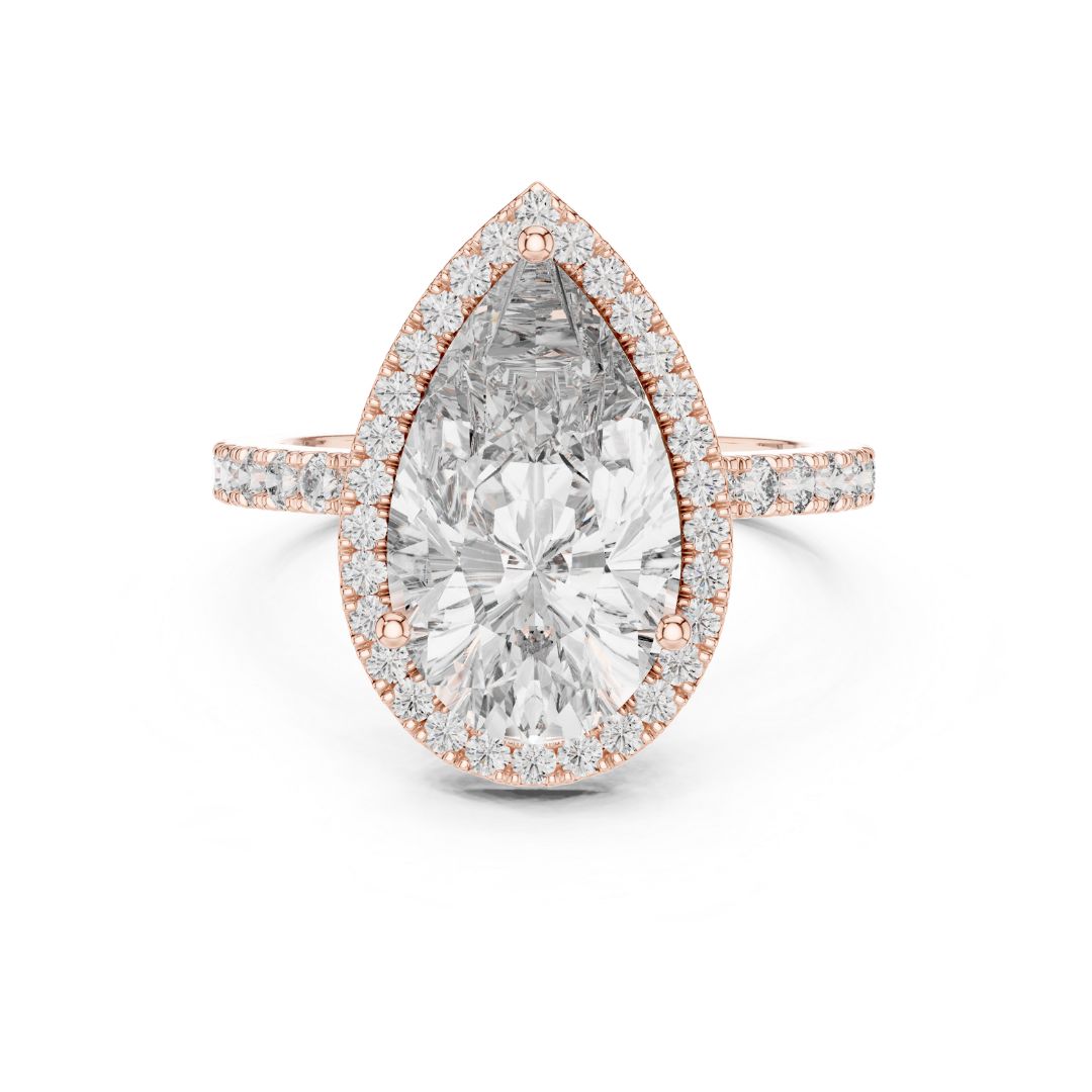 Rose gold ring with a pear-shaped moissanite diamond on a white background